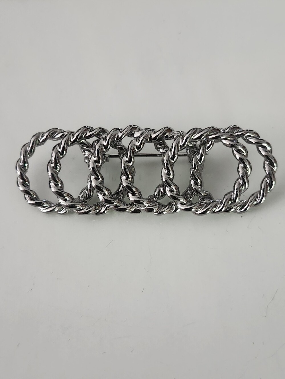 Interlocking Circles Silver-Tone Twisted Link Brooch